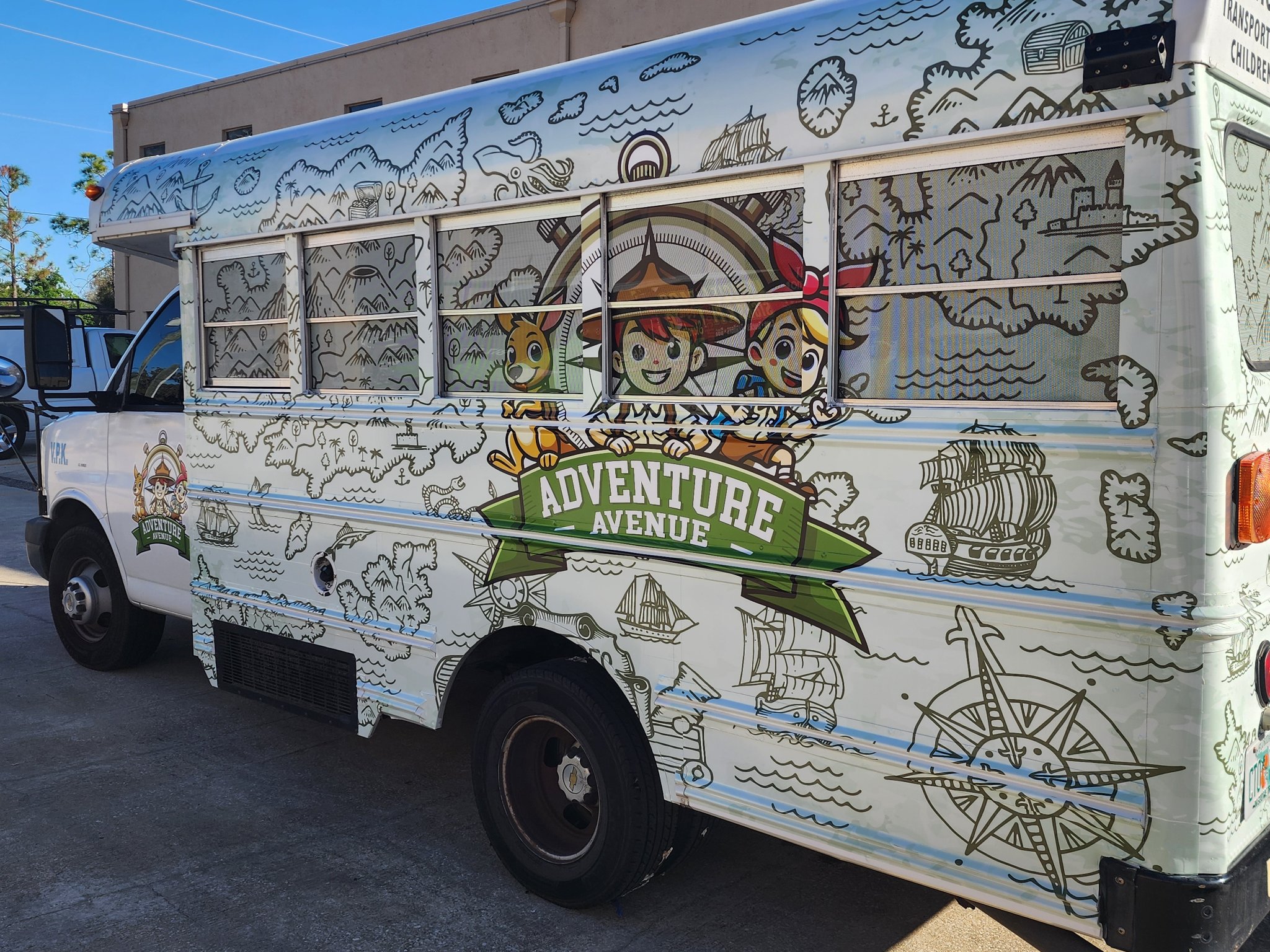 Adventure Avenue custom bus wrap by MORE PWS
